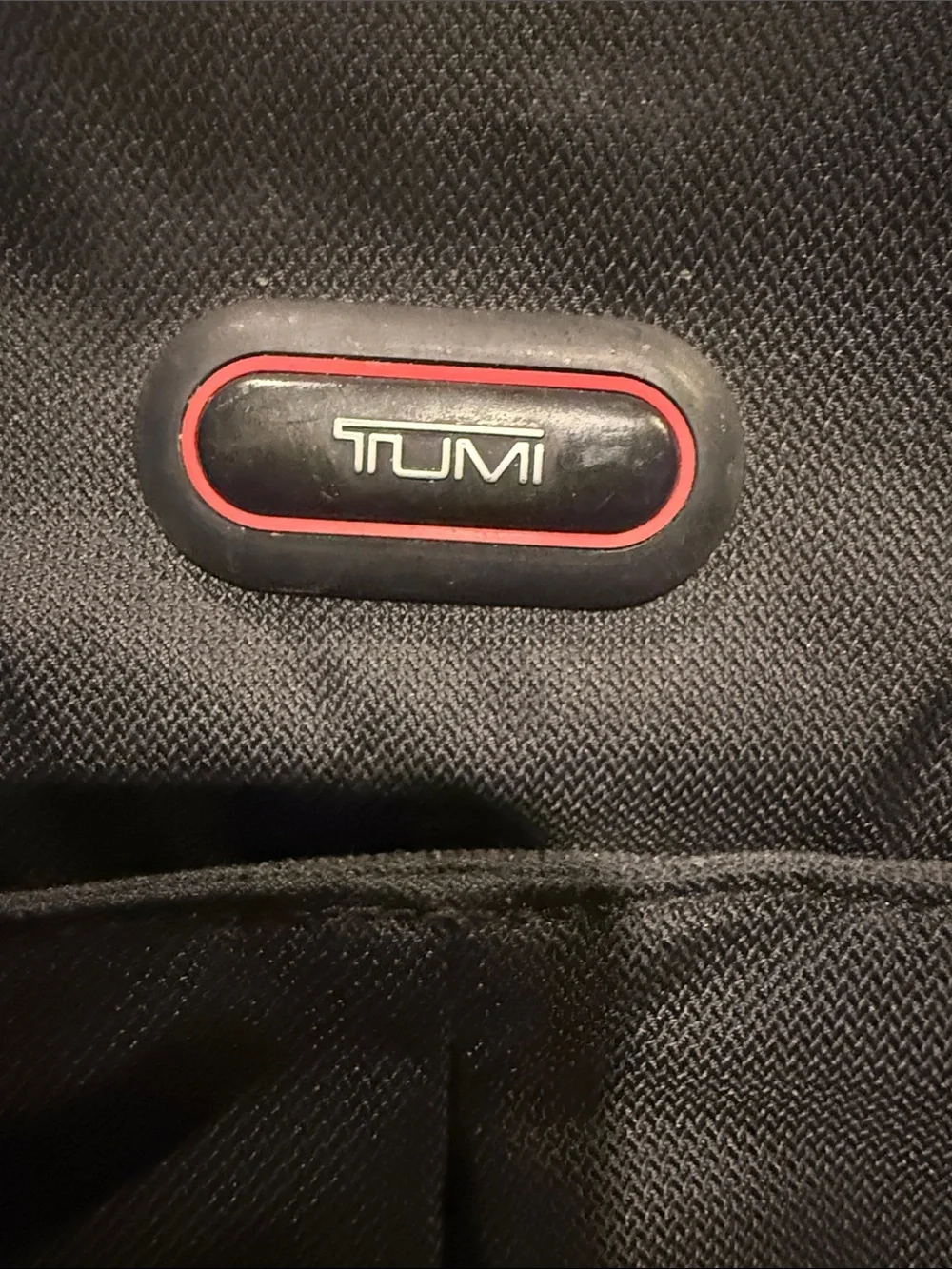 Tumi Black Nylon Men's Backpack with Red Logo Accent